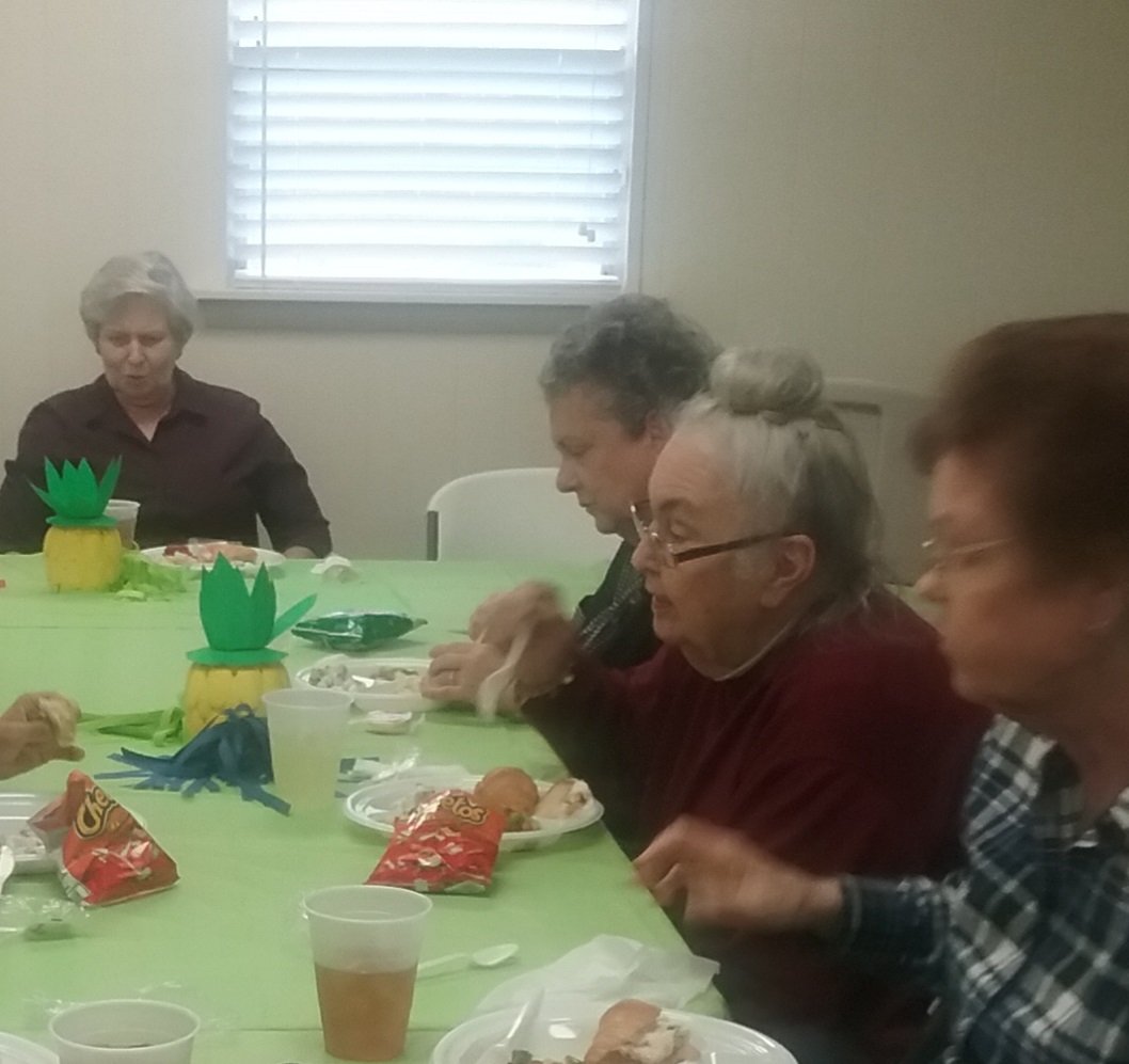 People talking and eating